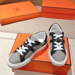Hermès color-blocked casual sneakers with metal buckles