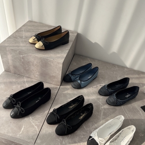 A collection of Chanel-style color-blocked flat shoes