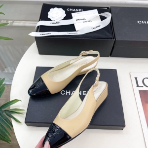 CREAM | Chanel 25K: New arrivals in Chanel's color-blocked open-back wedge sandal collection.