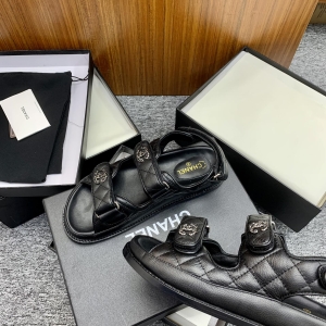 Chanel-style all-black quilted platform sandals