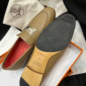 herme*H buckle loafers.